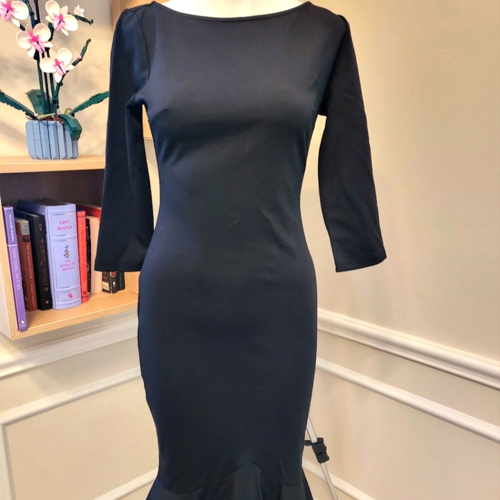BRAND new peplum hem dress
